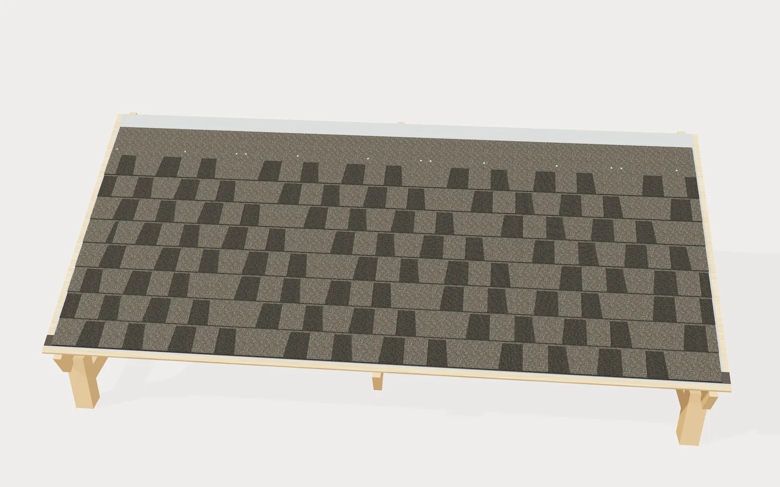 A mock-up roof section on a trestle with laminated shingles laid in a staggered five-course pattern.